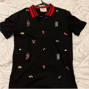Black Polo with Red Collar and Embroidered Accents